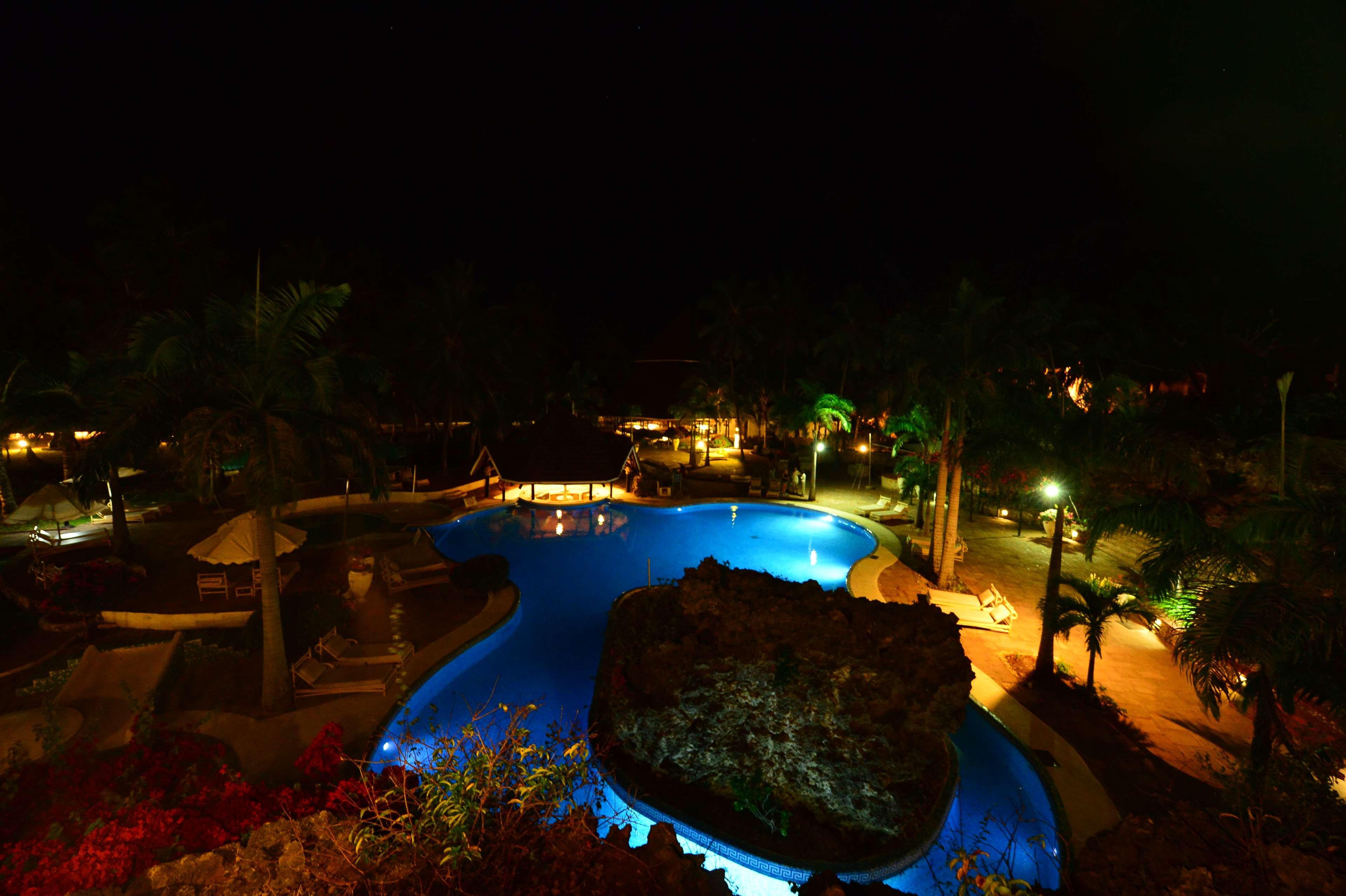 Diani Reef Beach Resort & Spa - Your Beachfront Bliss Awaits Diani Beach Exterior photo The pool at night