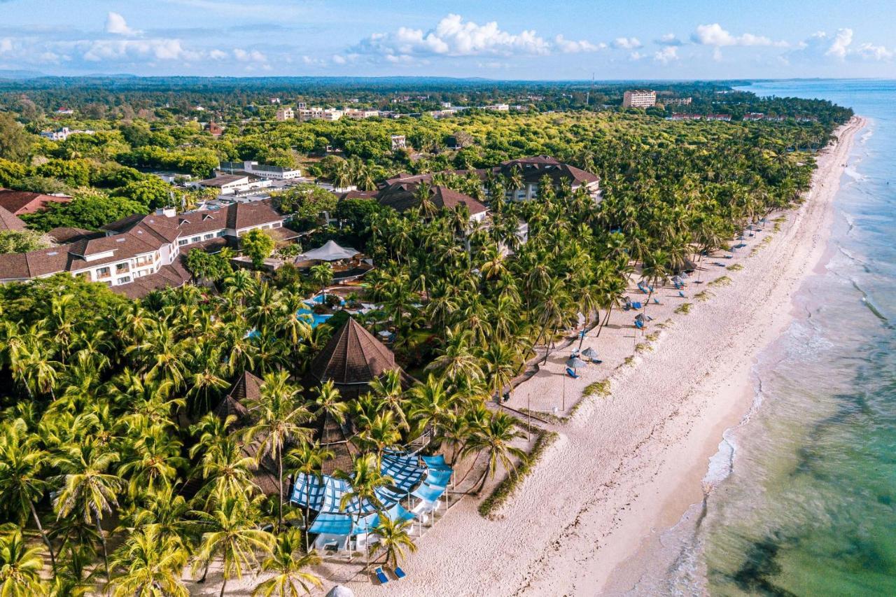 Diani Reef Beach Resort & Spa - Your Beachfront Bliss Awaits Diani Beach Exterior photo Aerial view of the resort