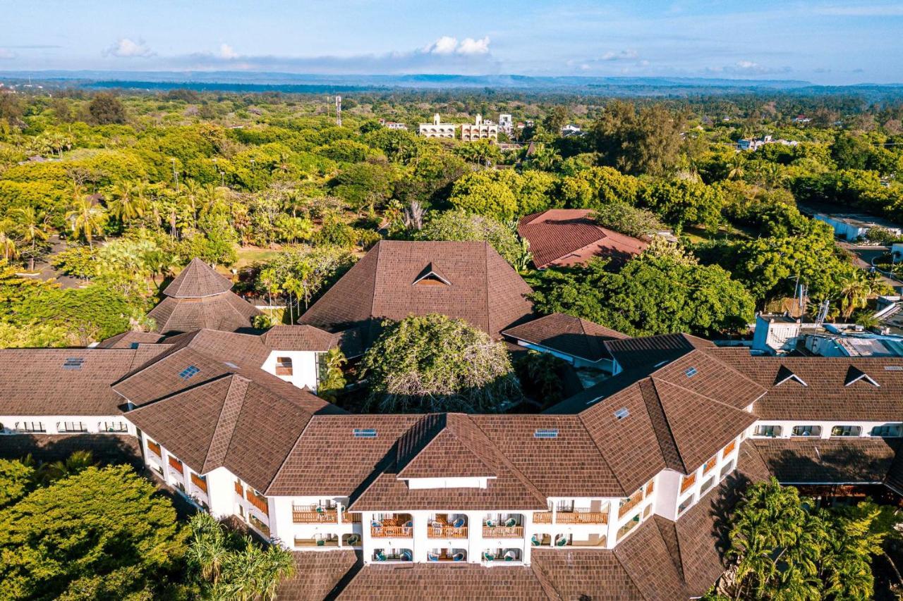 Diani Reef Beach Resort & Spa - Your Beachfront Bliss Awaits Diani Beach Exterior photo Aerial view of the hotel