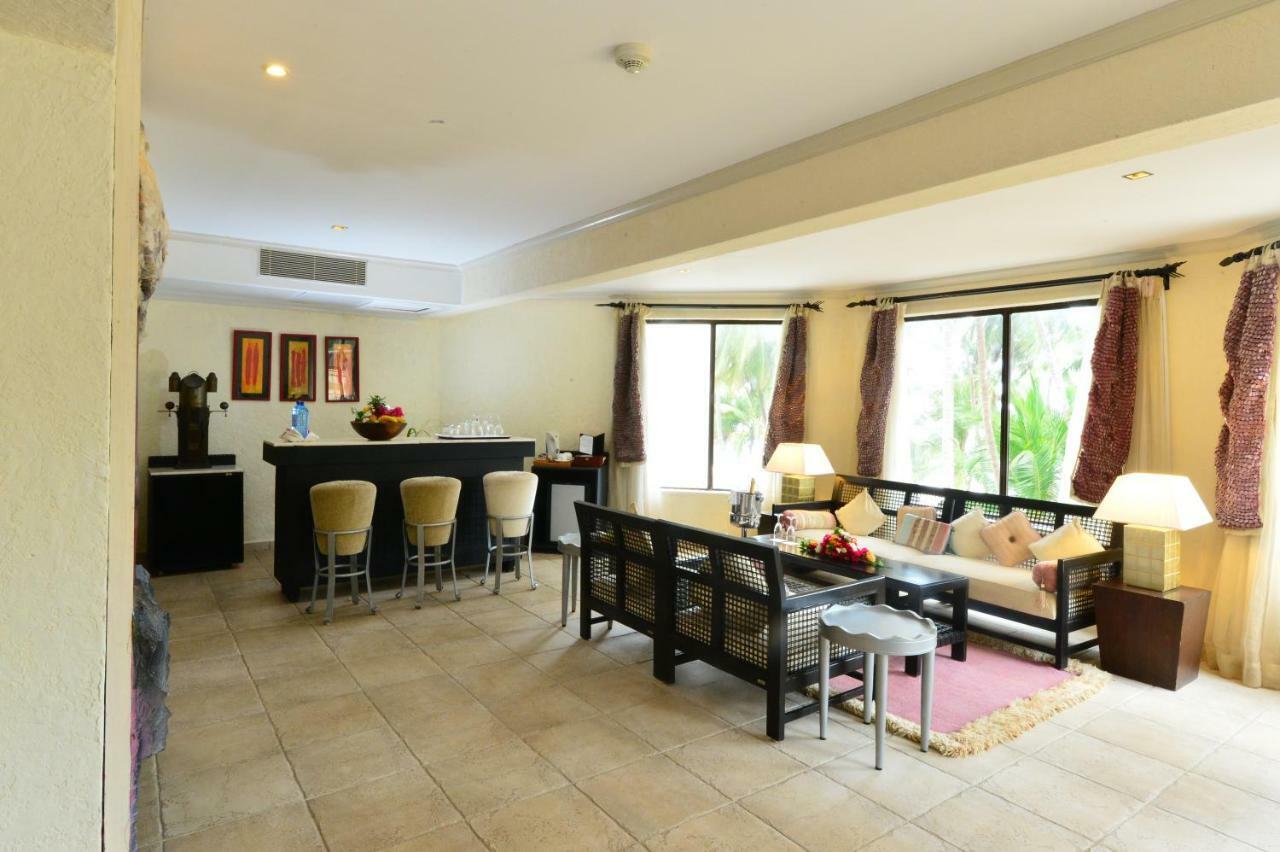 Diani Reef Beach Resort & Spa - Your Beachfront Bliss Awaits Diani Beach Exterior photo A living room in a typical apartment